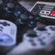 Close-up on a stash of retro Sony and Nintendo game console controllers